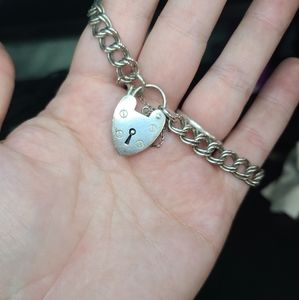 Heavy sterling silver lock bracelet with safety